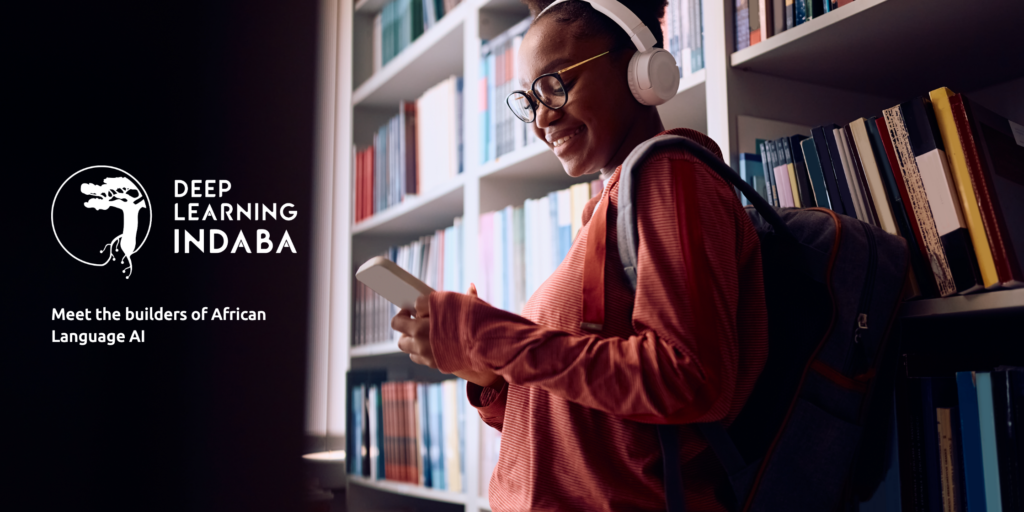 A smiling person with glasses and headphones stands in a library, looking at their mobile. They carry a rucksack. The Deep Learning Indaba logo and text, “Meet the builders of African Language AI,” appear on the left side of the image.